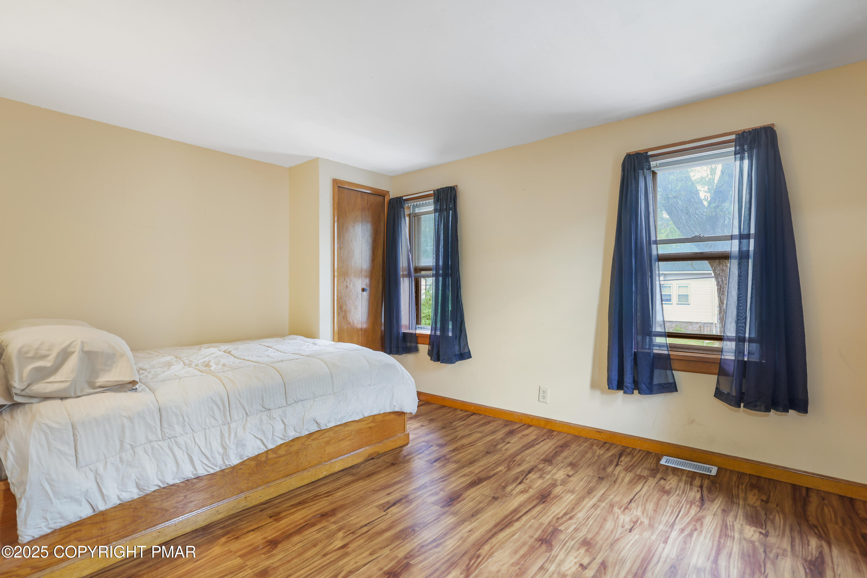 29 Reeder Street Mount Pocono, PA 18344 - Photo 36 of 50 a bedroom with a bed and a window