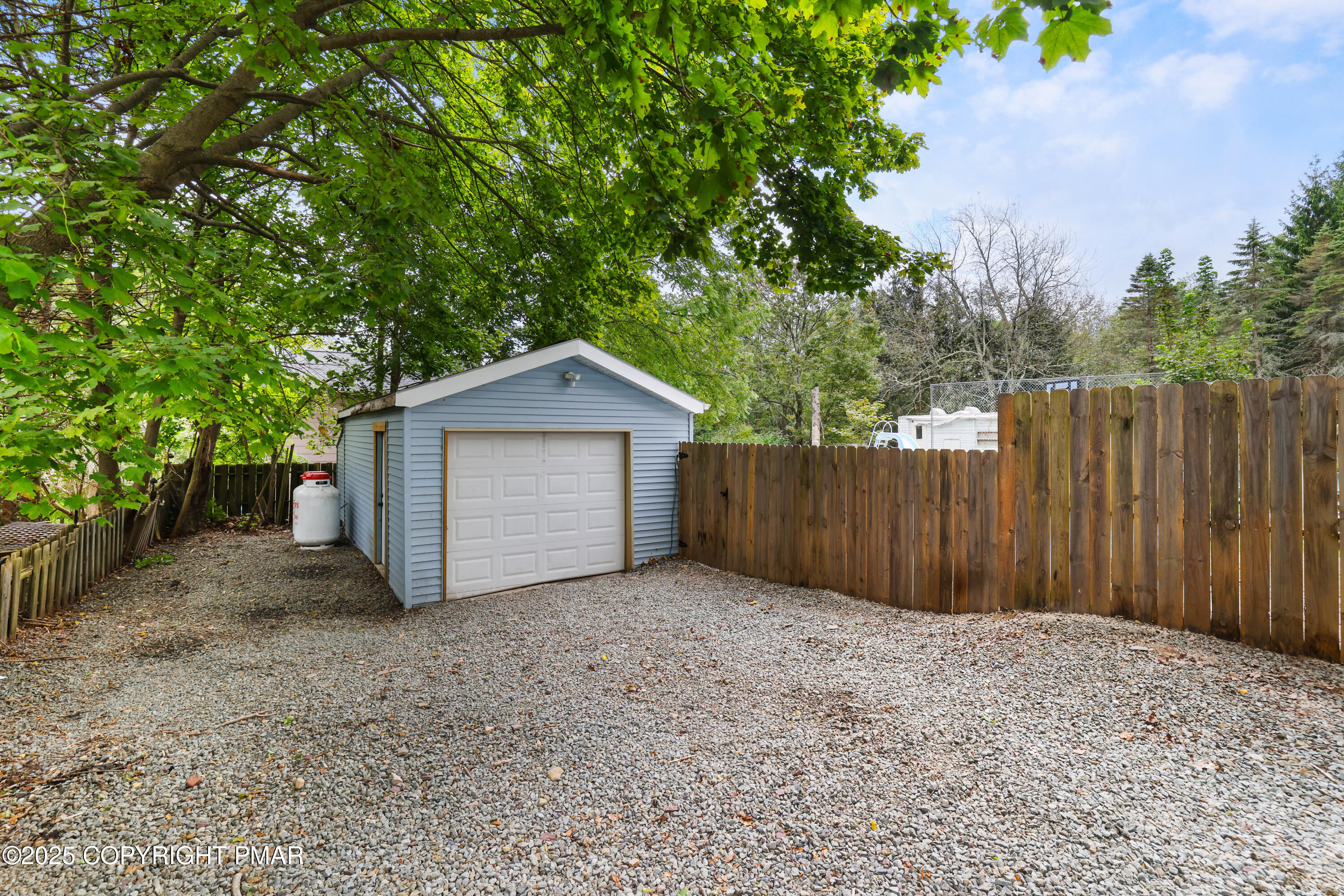 29 Reeder Street Mount Pocono, PA 18344 - Photo 50 of 50 a view of a house with a small yard and a large tree