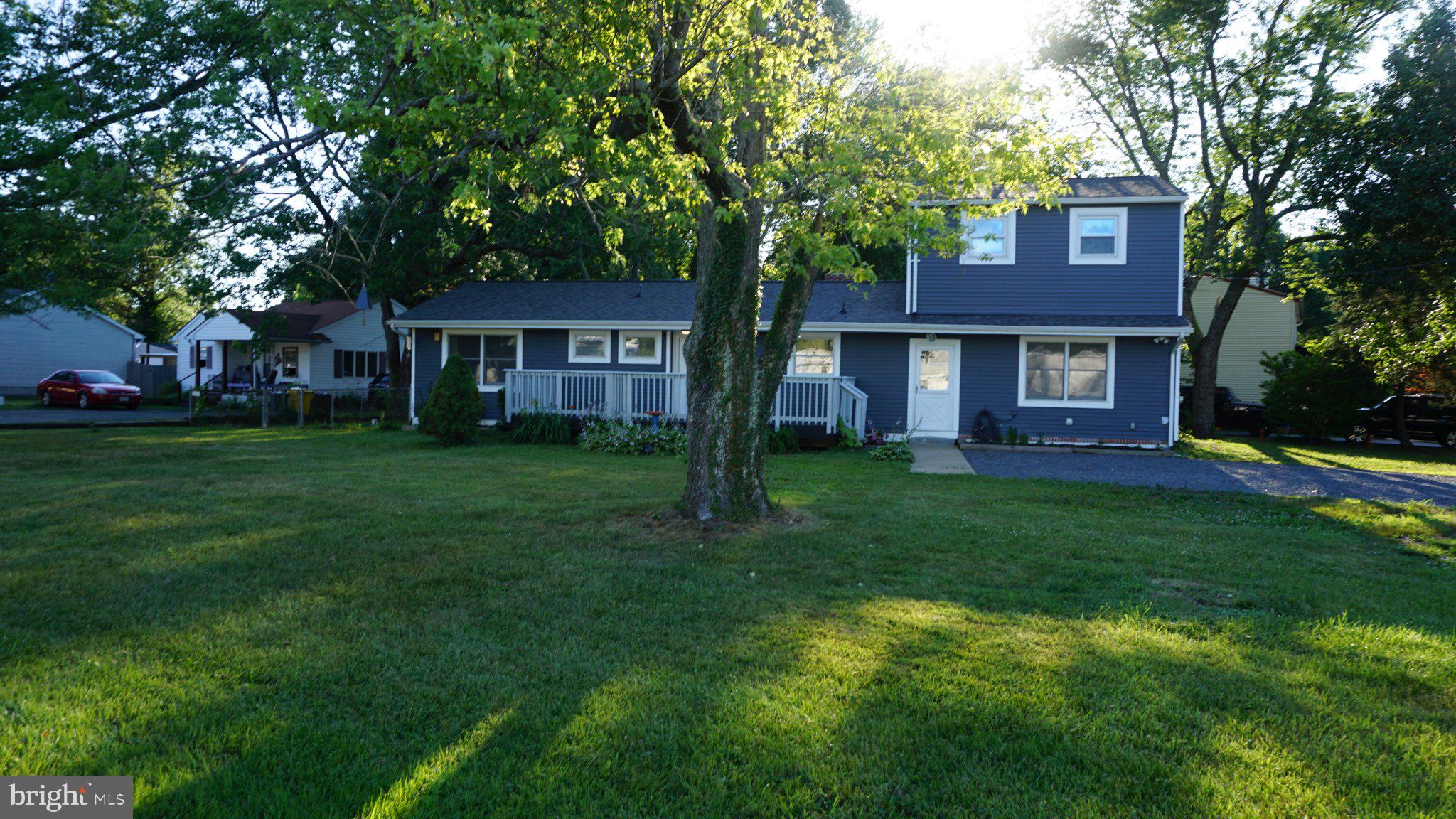 5854 Deale Churchton Road Deale, MD 20751 - Photo 3 of 57 Charming home with lush green lawn.