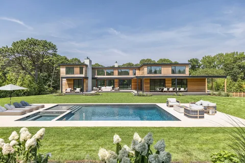 a view of a house with a big yard