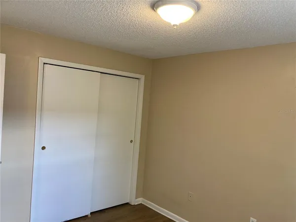 a bathroom with a sink a toilet and bathtub