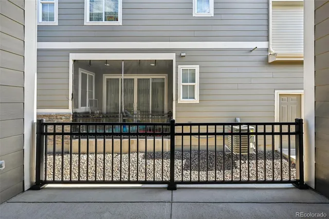 a view of a brick house with a roof