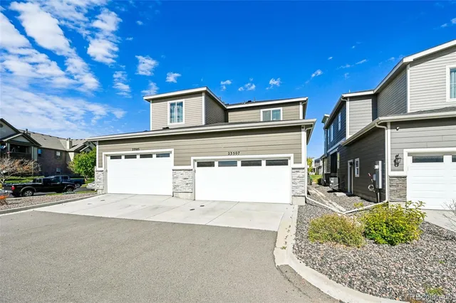 a view of a house with a garage