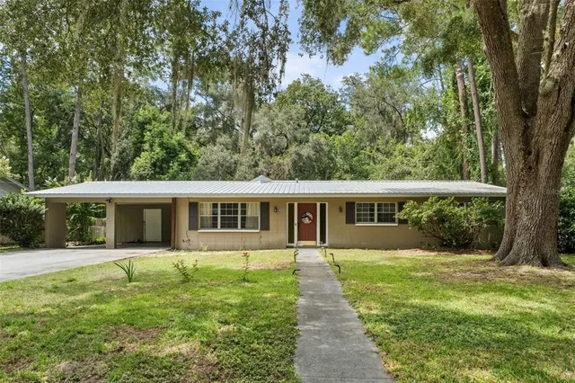 front view of a house with a yard