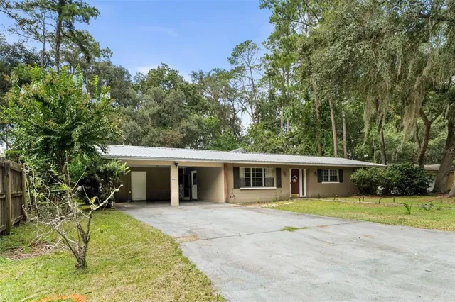 a view of a house with a swimming pool