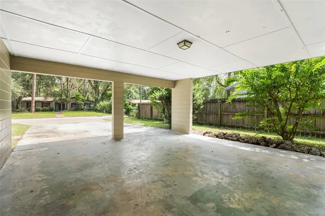 a view of a garden with an outdoor space