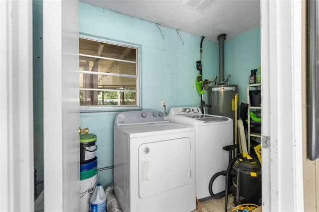 a utility room with dryer and washer