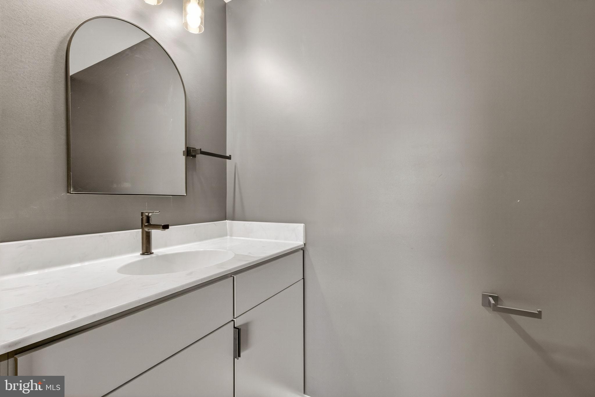 4101 Supinlick Ridge Road Mount Jackson, VA 22842 - Photo 25 of 34 a bathroom with a sink and mirror