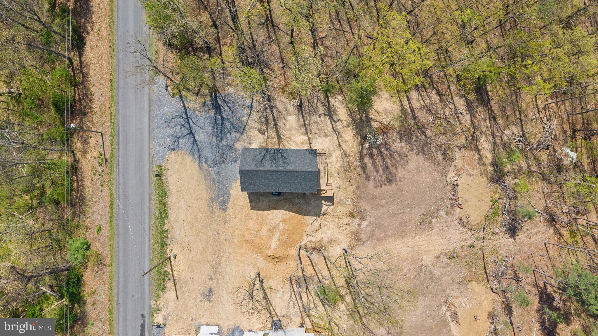 4101 Supinlick Ridge Road Mount Jackson, VA 22842 - Photo 3 of 34 a backyard of a house with large trees