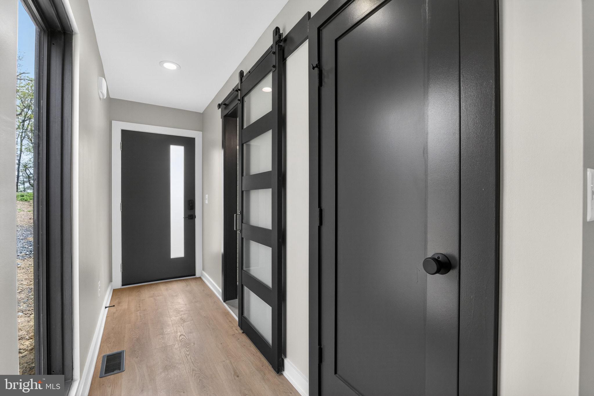 4101 Supinlick Ridge Road Mount Jackson, VA 22842 - Photo 7 of 34 a view of a hallway with wooden floor