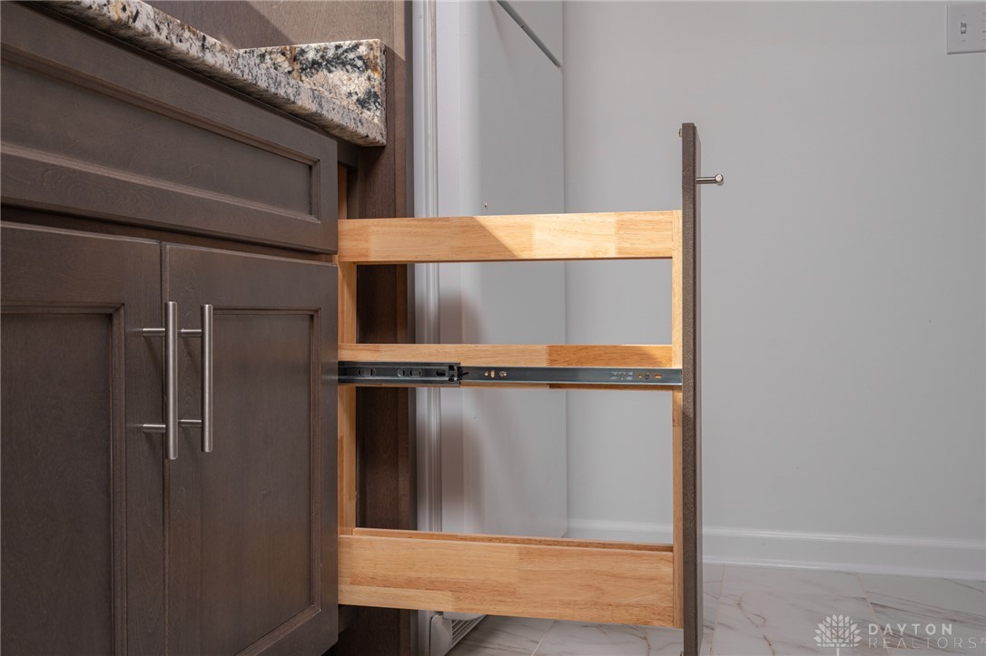 326 North Bromfield Road Kettering, OH 45429 - Photo 12 of 30 This thoughtfully designed cabinet features convenient pull-out shelving for optimal organization.