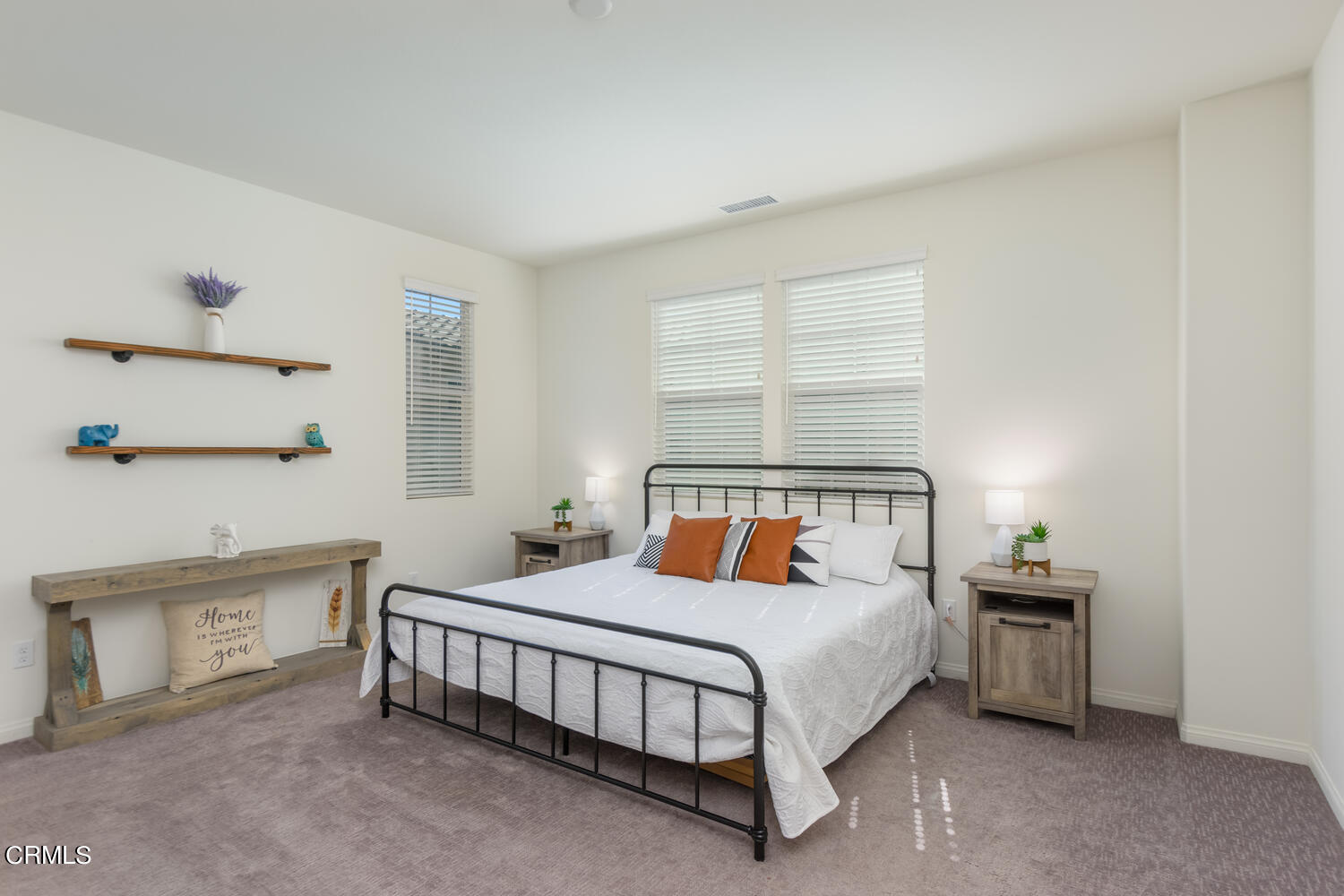 217 Stonegate Road Camarillo, CA 93010 - Photo 18 of 33 a bedroom with a bed and a night stand