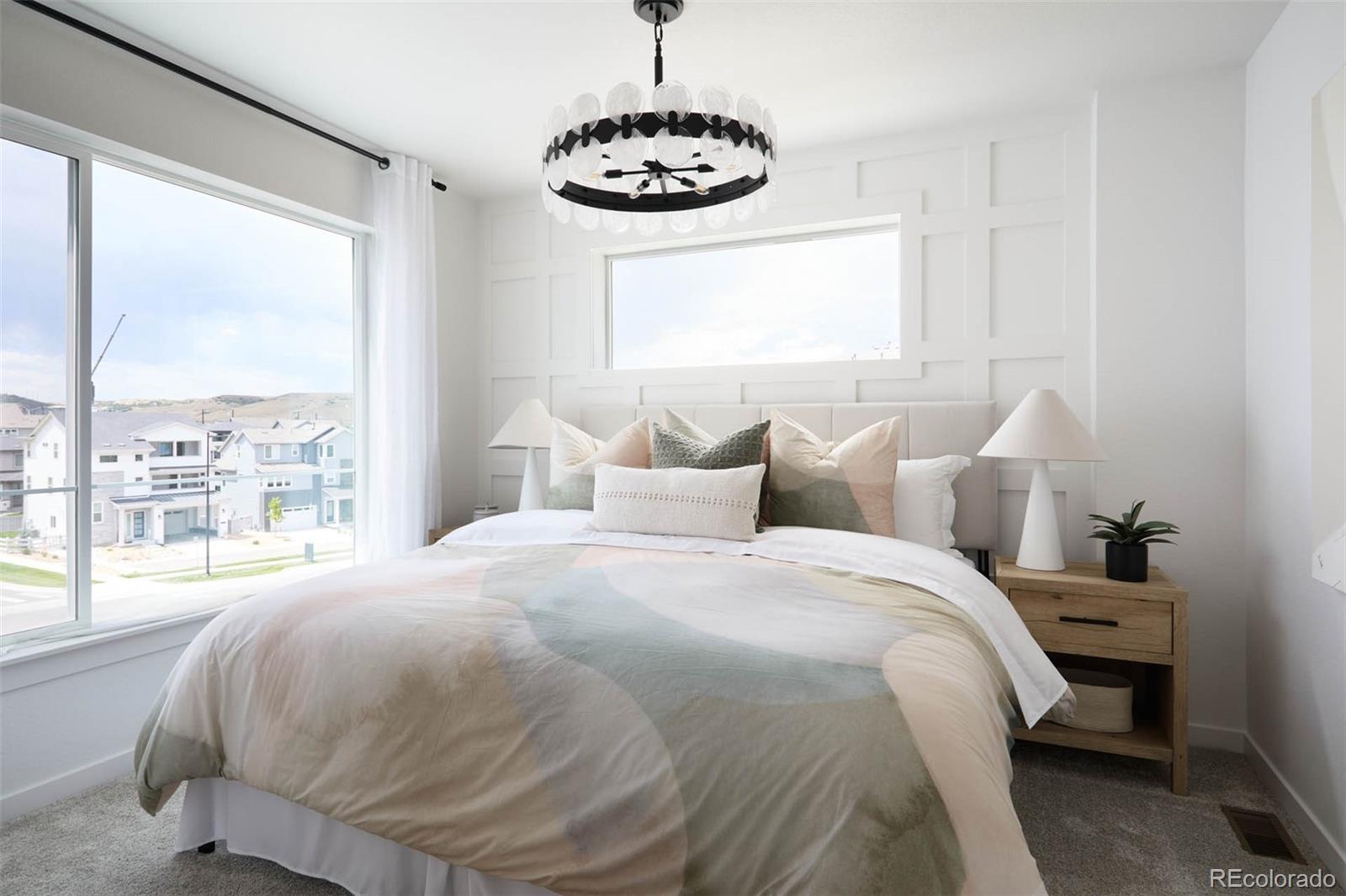 11954 Soprano Trail Lone Tree, CO 80134 - Photo 9 of 11 a bedroom with a bed and a window