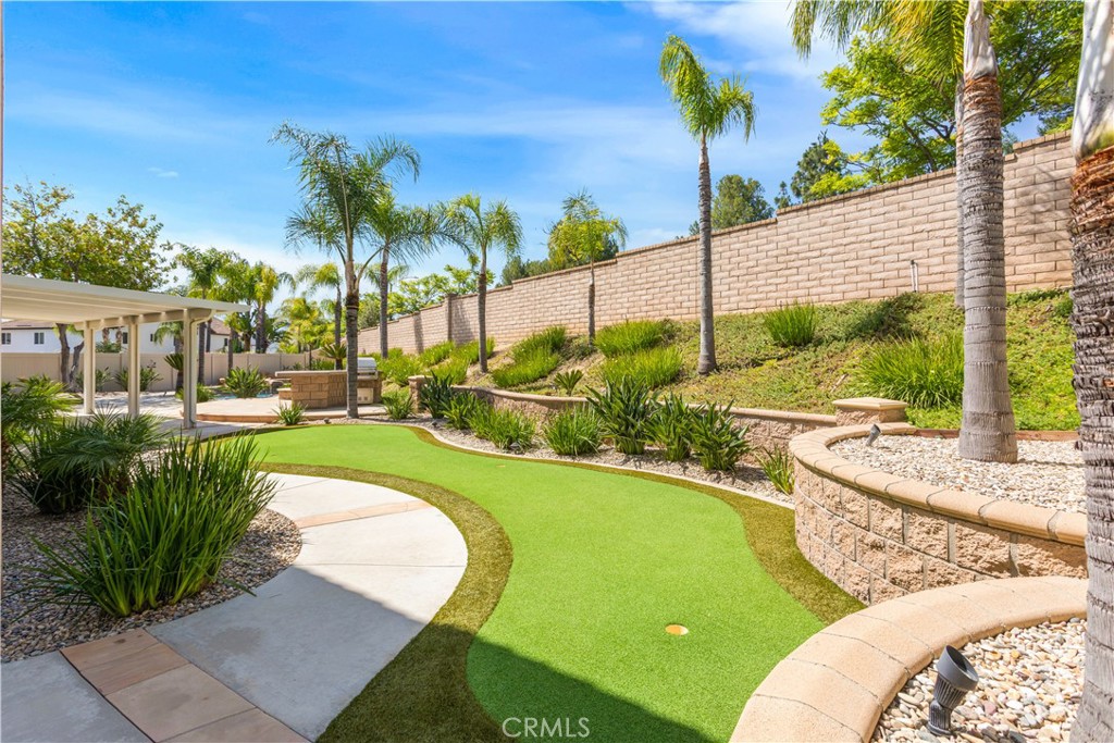 33351 Nicholas Common Temecula, CA 92592 - Photo 29 of 42 a view of a swimming pool with a patio