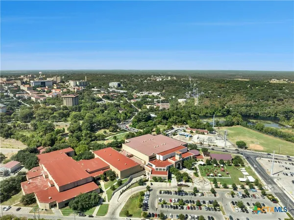 an aerial view of residential building with outdoor space