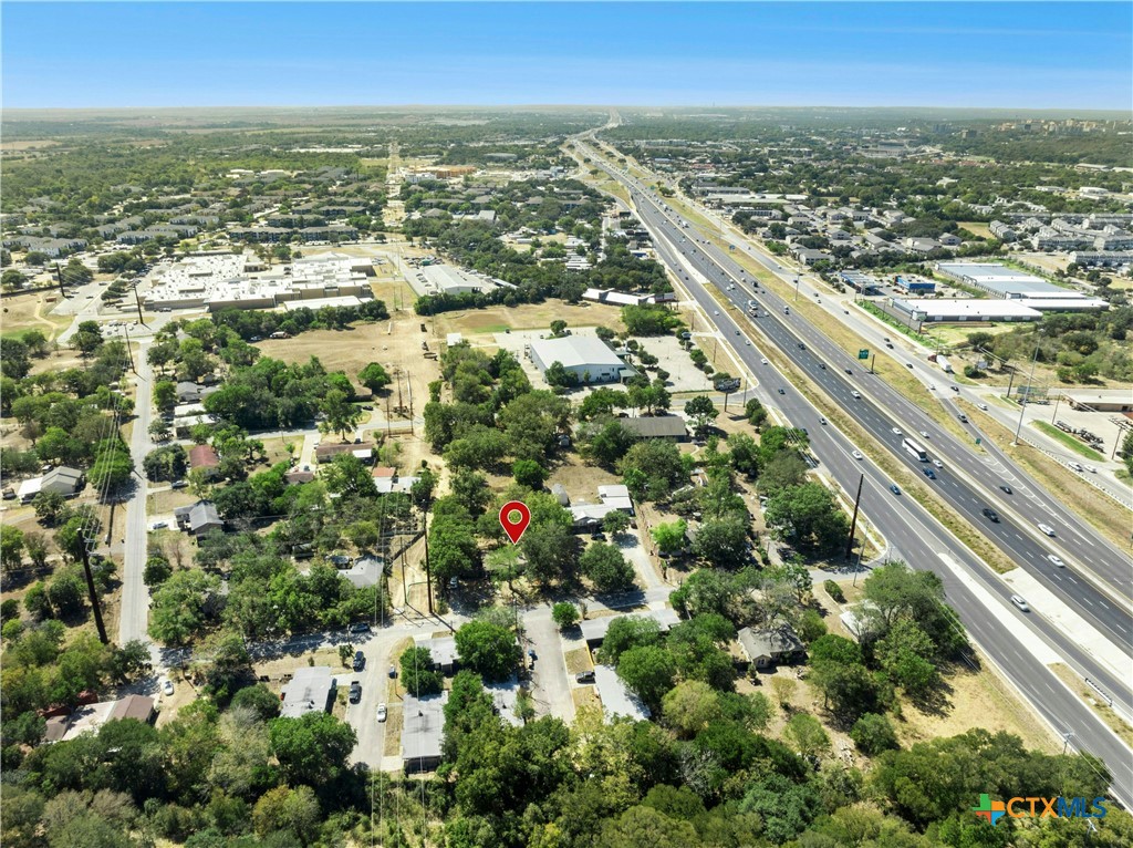 1007 Hackberry Street San Marcos, TX 78666 - Photo 32 of 36 an aerial view of residential houses with city view