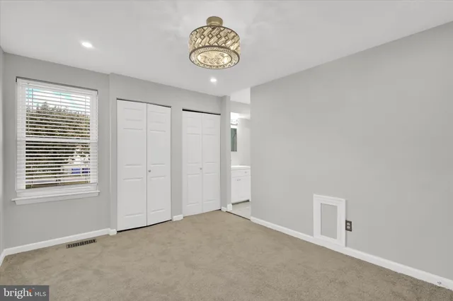 a view of an empty room with window