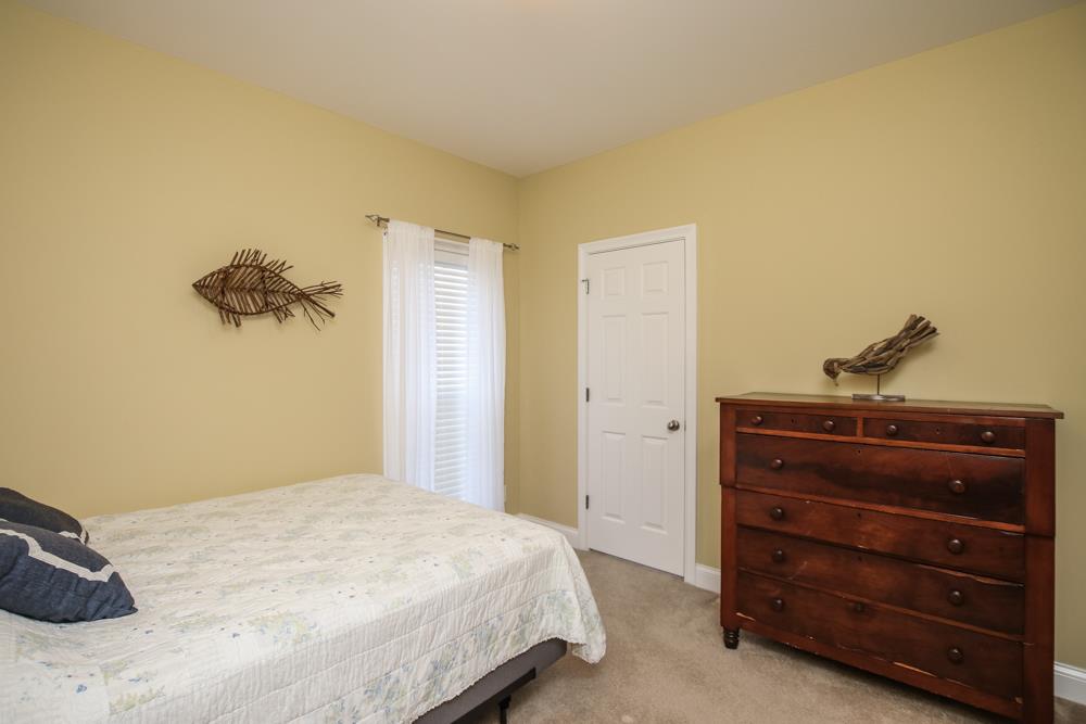605 Lee Road Lebanon, TN 37087 - Photo 17 of 30 a bedroom with a bed and a dresser