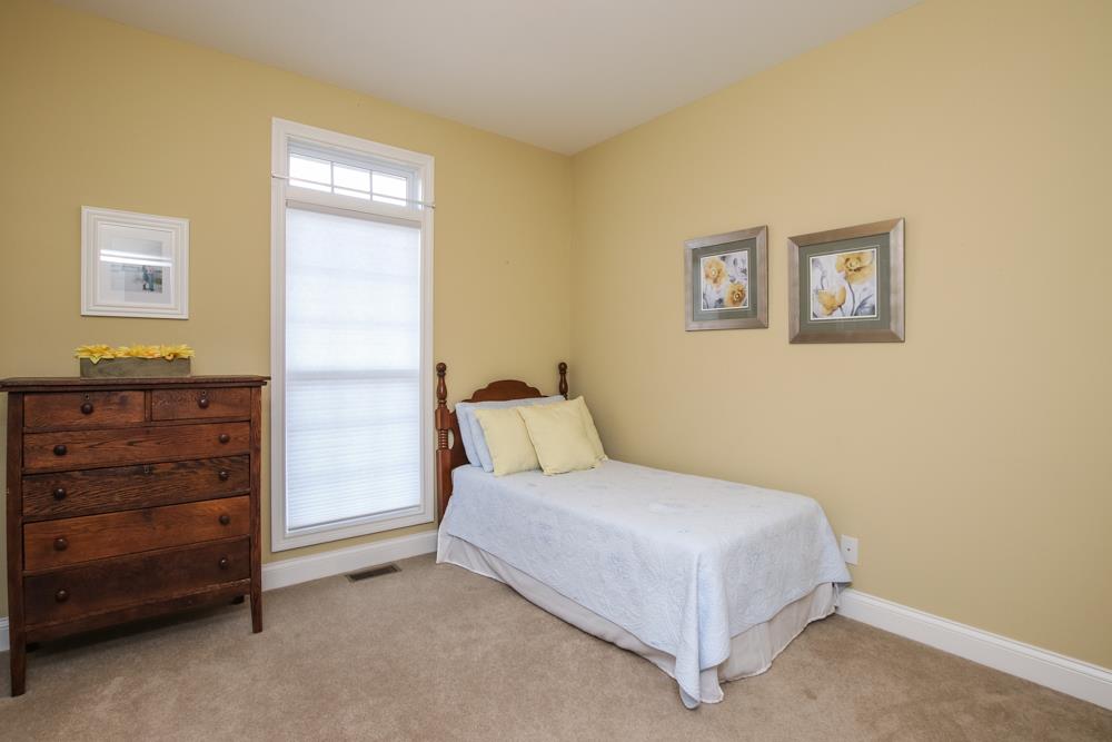605 Lee Road Lebanon, TN 37087 - Photo 20 of 30 a bedroom with a bed and cabinet