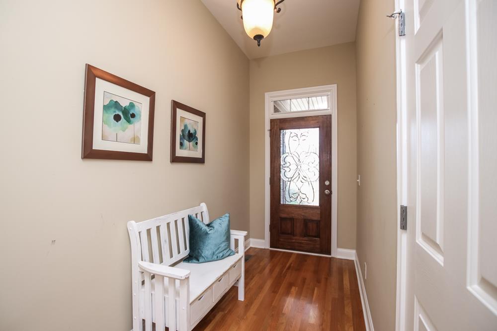 605 Lee Road Lebanon, TN 37087 - Photo 23 of 30 a view of a bedroom with wooden floor and windows