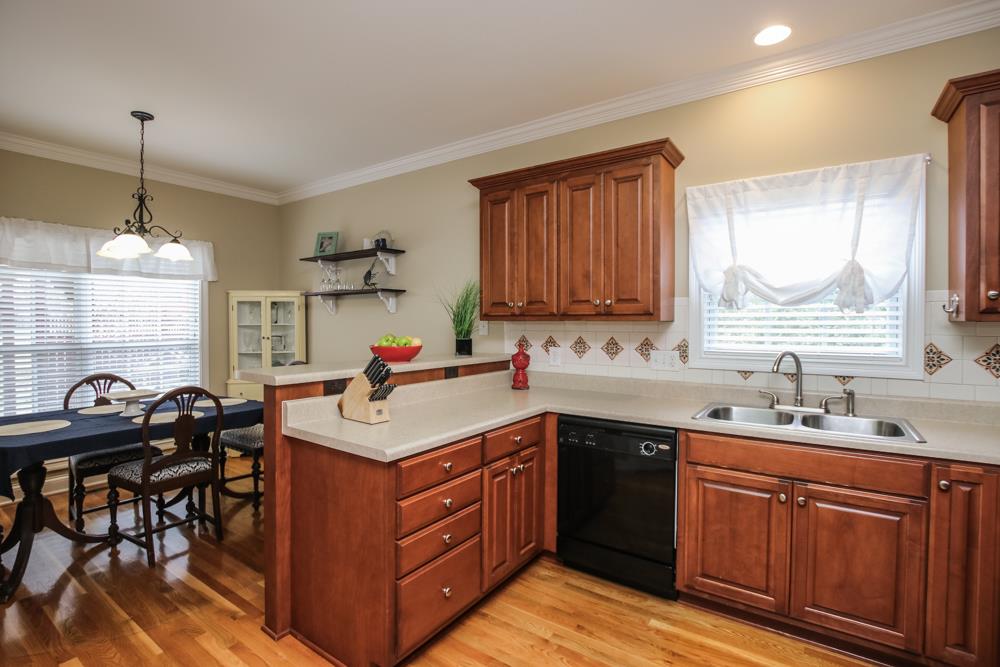 605 Lee Road Lebanon, TN 37087 - Photo 4 of 30 a kitchen with a sink stove and cabinets