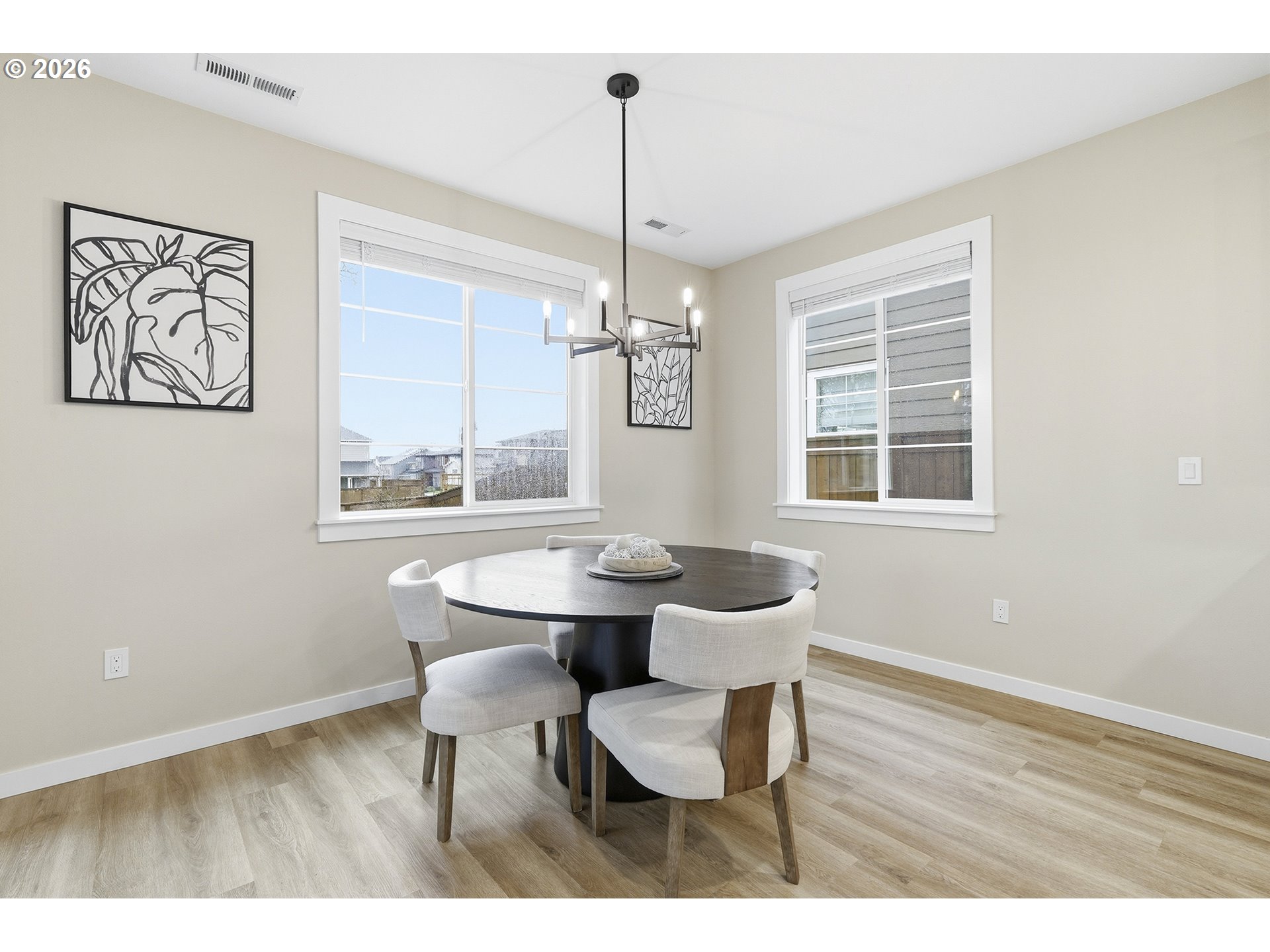 6724 Southwest Lupine Way Wilsonville, OR 97070 - Photo 19 of 45 a dining room with furniture and window