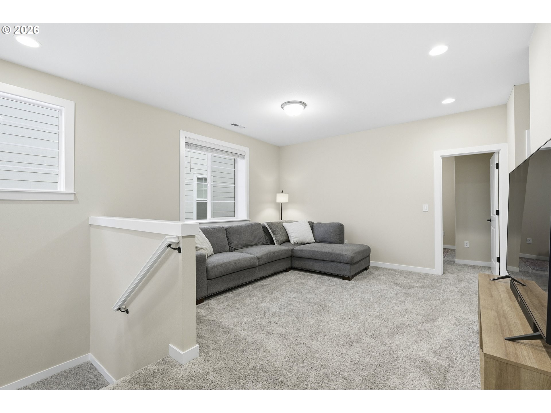6724 Southwest Lupine Way Wilsonville, OR 97070 - Photo 23 of 45 a living room with furniture and a flat screen tv