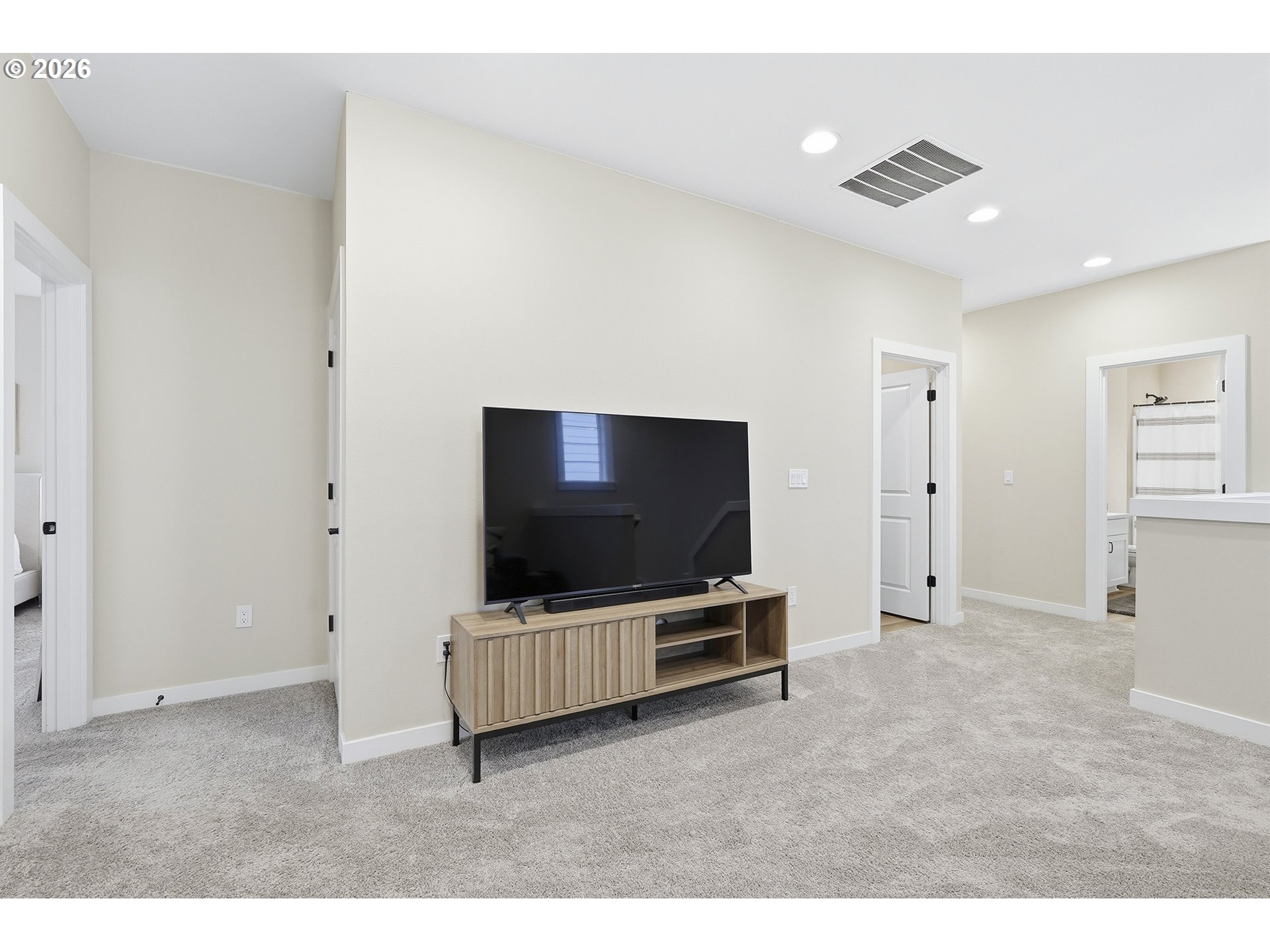 6724 Southwest Lupine Way Wilsonville, OR 97070 - Photo 25 of 45 a living room with furniture and a flat screen tv