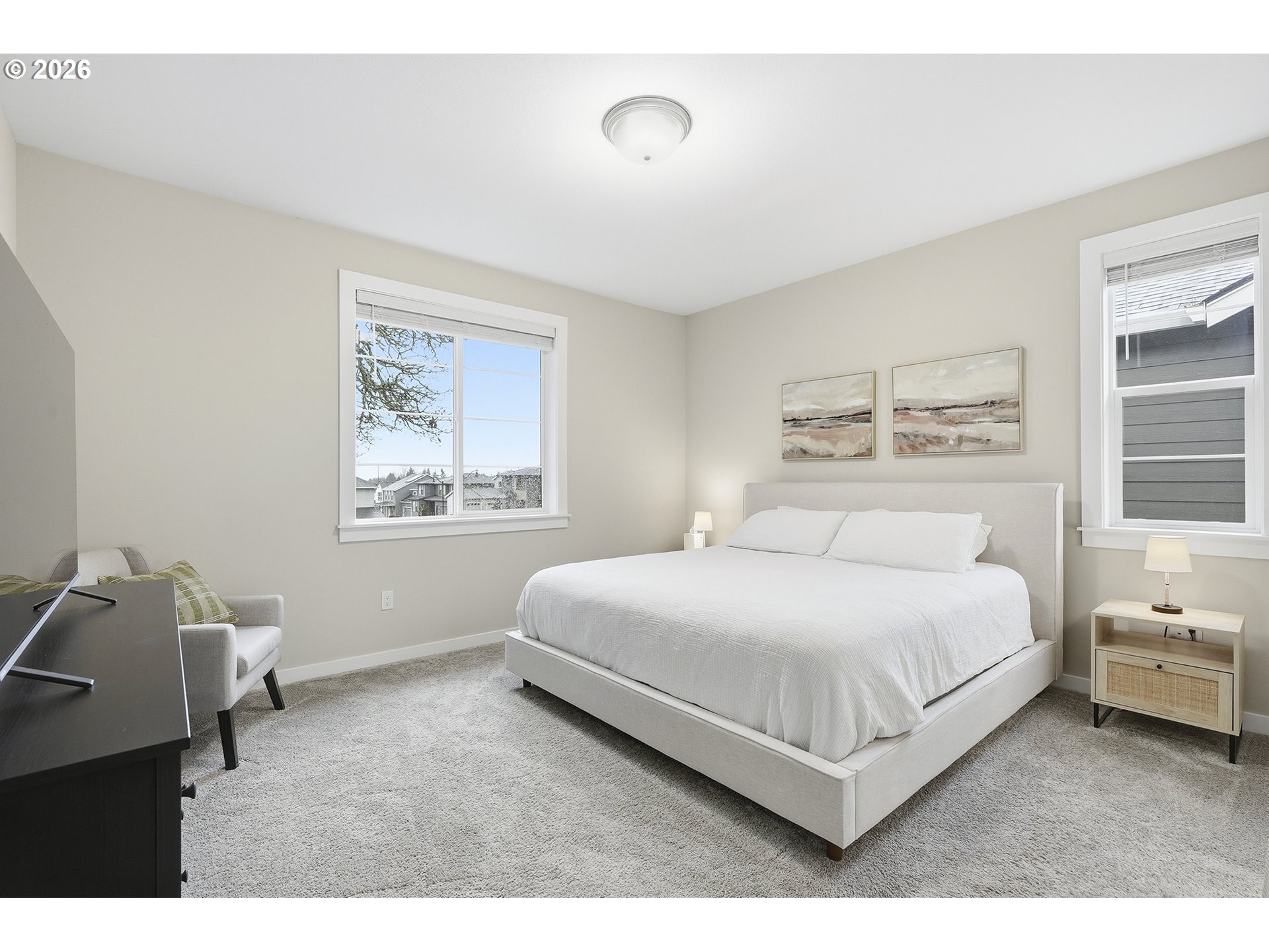 6724 Southwest Lupine Way Wilsonville, OR 97070 - Photo 29 of 45 a bedroom with a bed and a painting on the wall