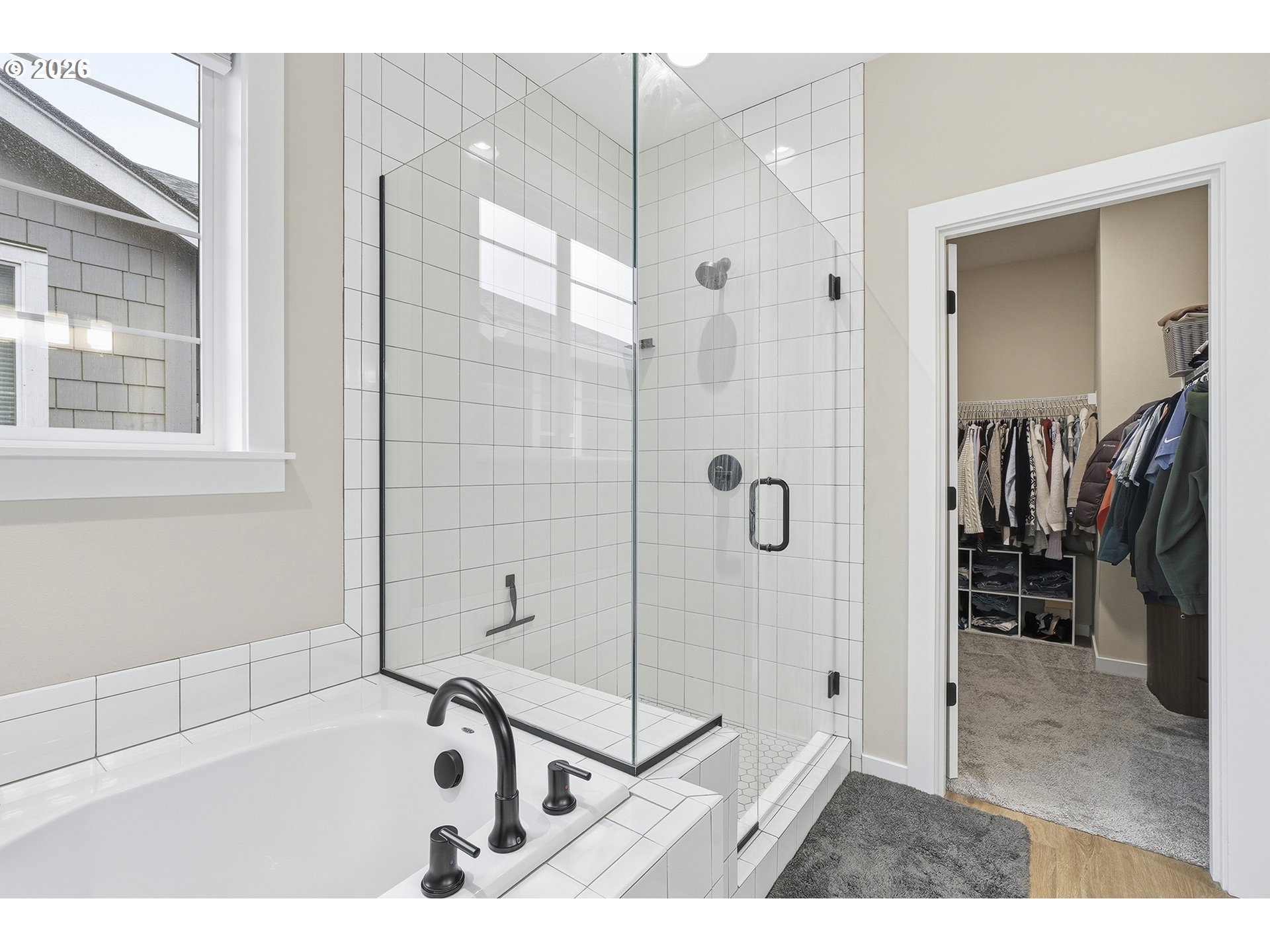 6724 Southwest Lupine Way Wilsonville, OR 97070 - Photo 37 of 45 a bathroom with a tub and a shower