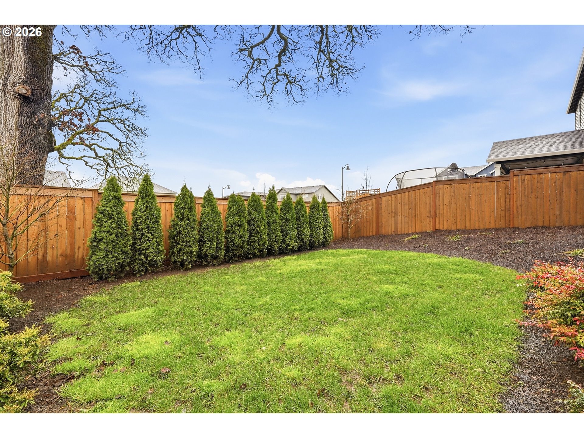 6724 Southwest Lupine Way Wilsonville, OR 97070 - Photo 44 of 45 a view of a yard