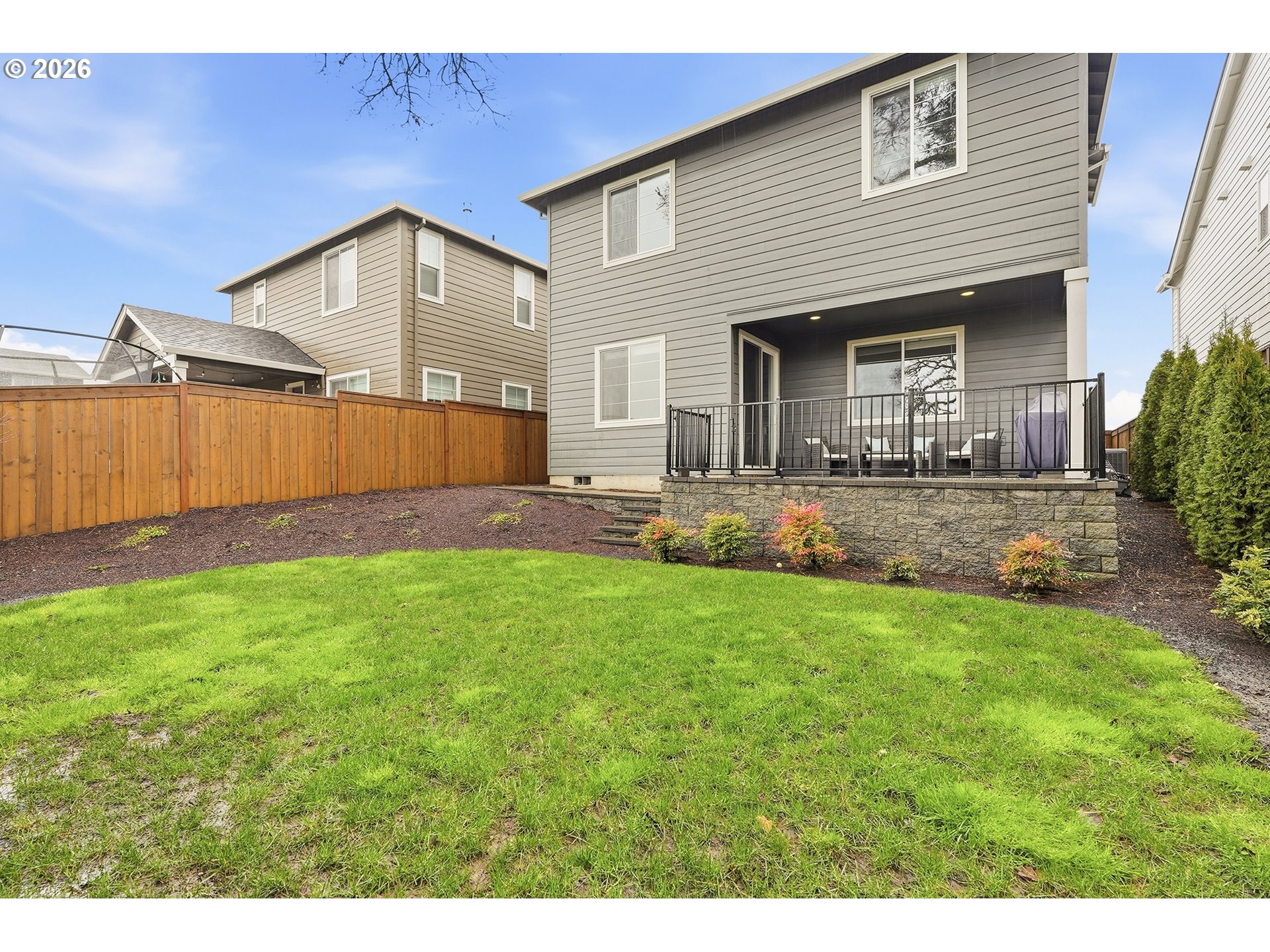 6724 Southwest Lupine Way Wilsonville, OR 97070 - Photo 45 of 45 a front view of house with yard and outdoor seating