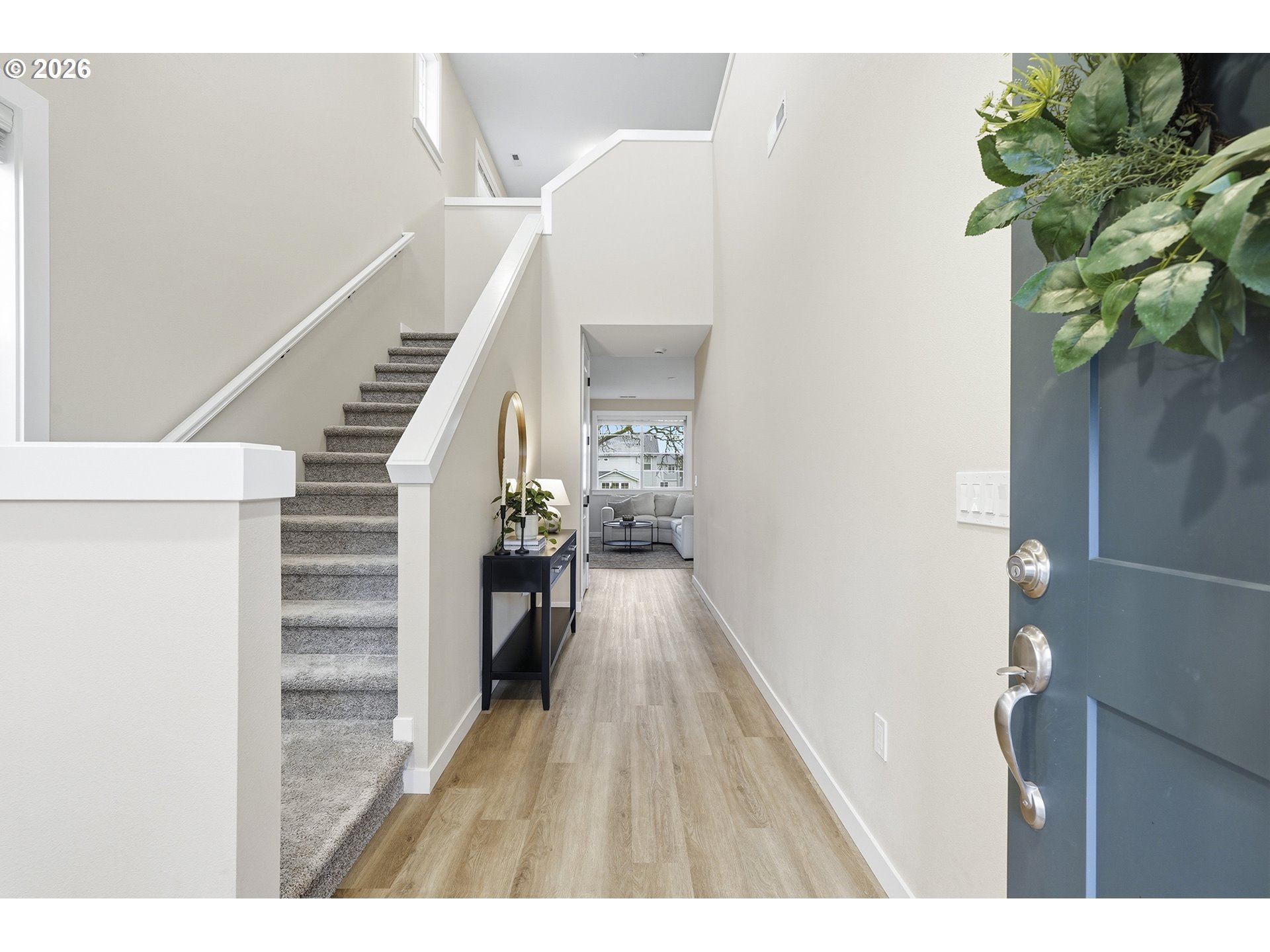 6724 Southwest Lupine Way Wilsonville, OR 97070 - Photo 6 of 45 a view of hallway with wooden floor