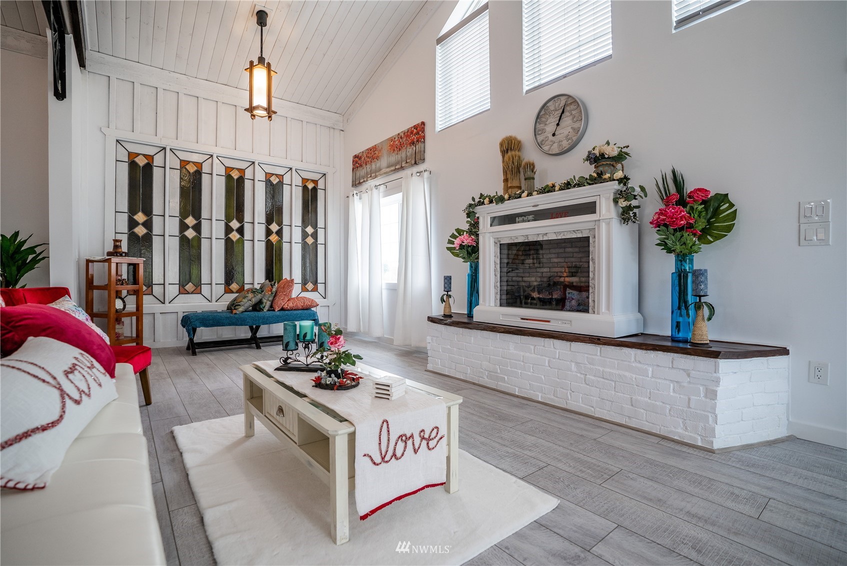 3114 Jackson Highway Chehalis, WA 98532 - Photo 15 of 40 a living room with furniture fireplace and potted plant