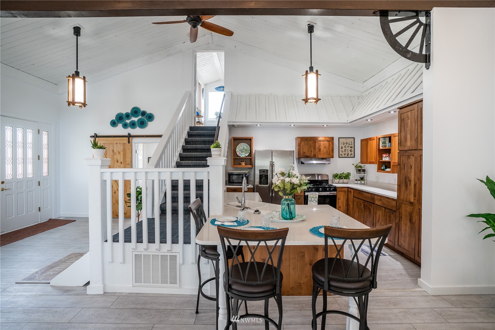 3114 Jackson Highway Chehalis, WA 98532 - Photo 18 of 40 a view of a dining room with furniture wooden floor and chandelier