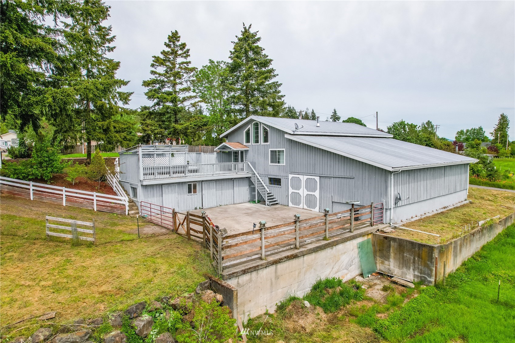 3114 Jackson Highway Chehalis, WA 98532 - Photo 2 of 40 a house view with a swimming pool and sitting space
