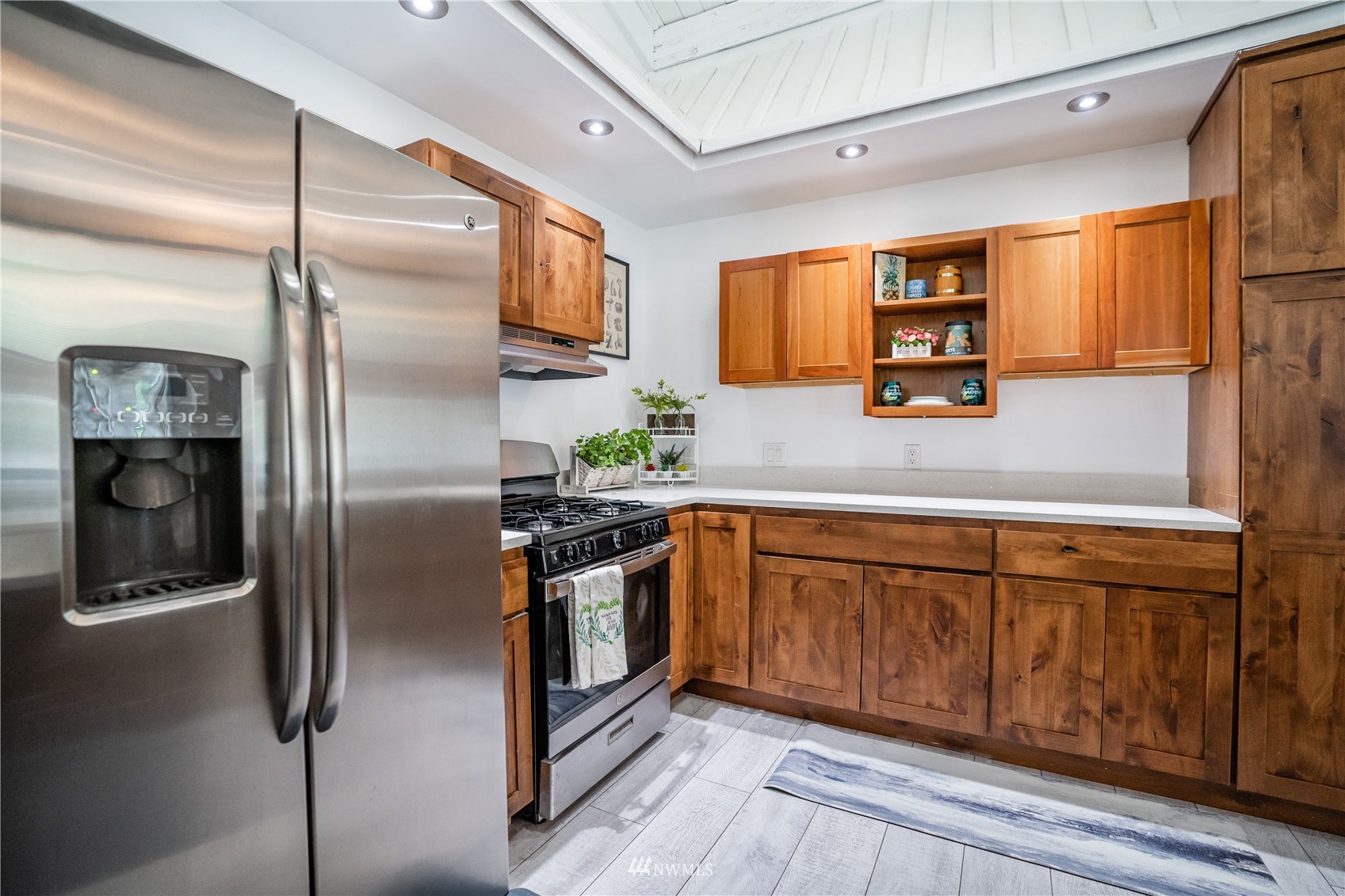 3114 Jackson Highway Chehalis, WA 98532 - Photo 22 of 40 a kitchen with stainless steel appliances granite countertop a refrigerator and a sink