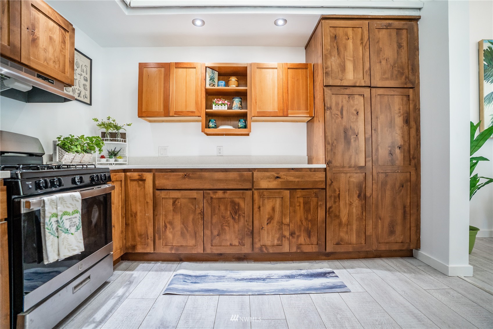 3114 Jackson Highway Chehalis, WA 98532 - Photo 23 of 40 a kitchen with stainless steel appliances granite countertop wooden cabinets a refrigerator and a sink
