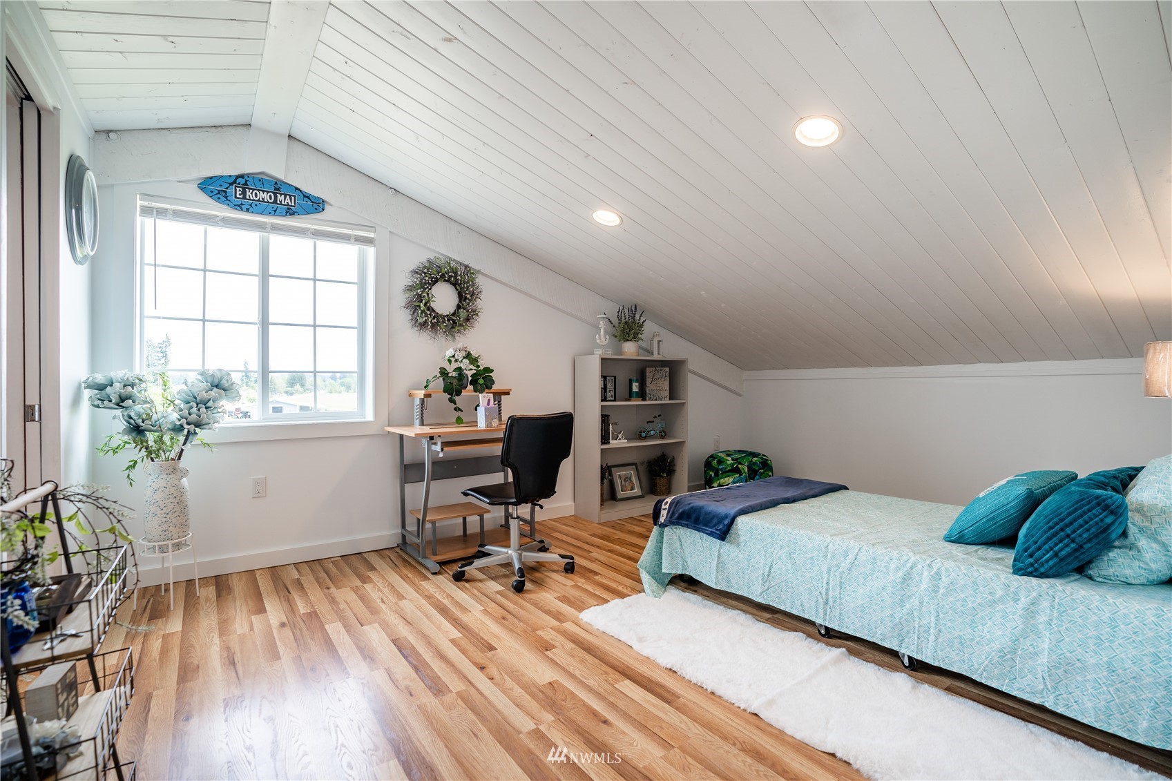 3114 Jackson Highway Chehalis, WA 98532 - Photo 30 of 40 a bedroom with a bed and wooden floor