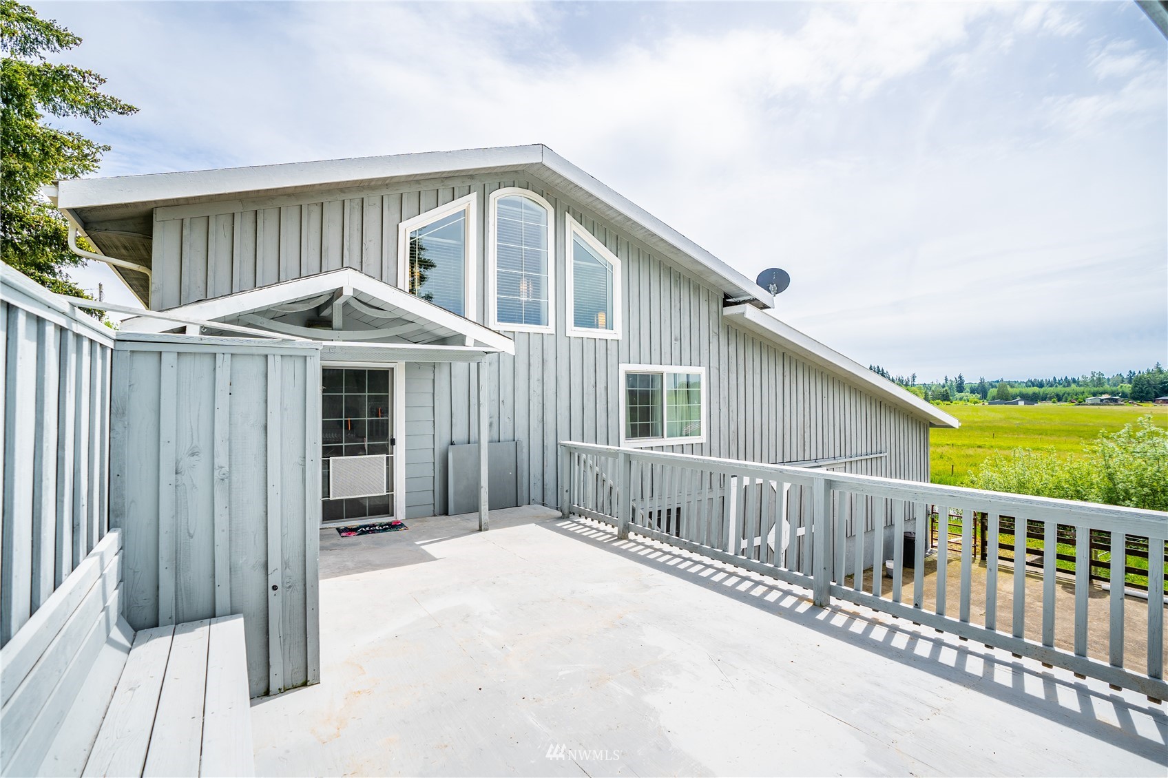 3114 Jackson Highway Chehalis, WA 98532 - Photo 3 of 40 a front view of a house with balcony