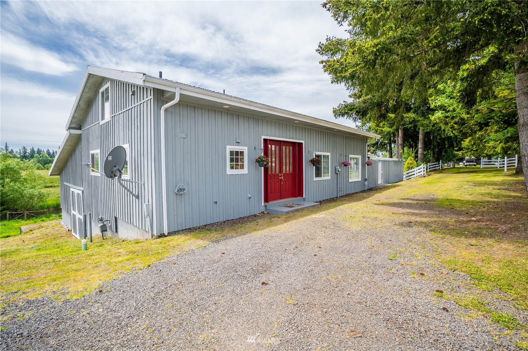 3114 Jackson Highway Chehalis, WA 98532 - Photo 5 of 40 a view of a house with backyard and trees
