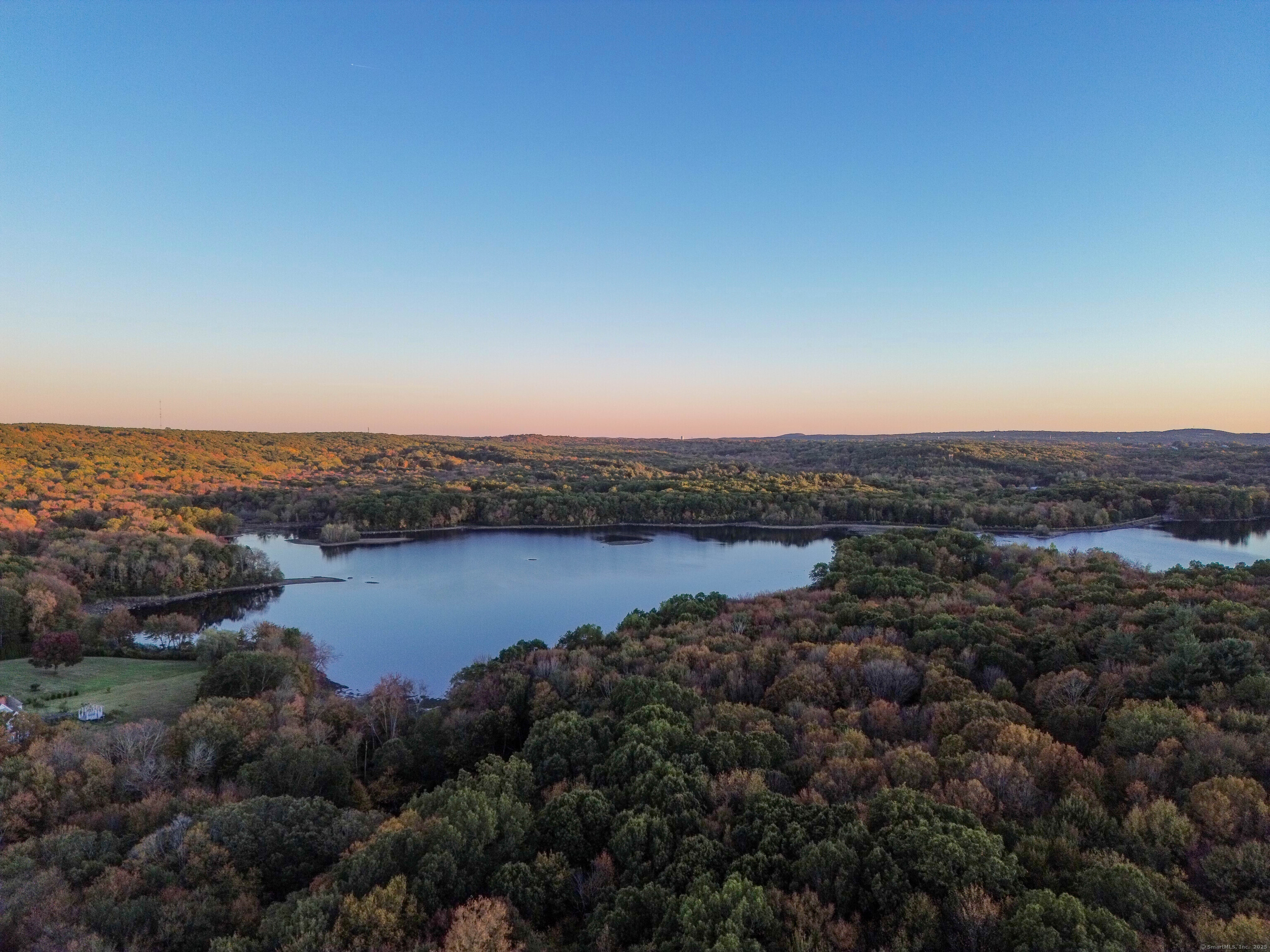 Coe Road Wolcott, CT 06716 - Photo 4 of 24 a view of lake and mountain
