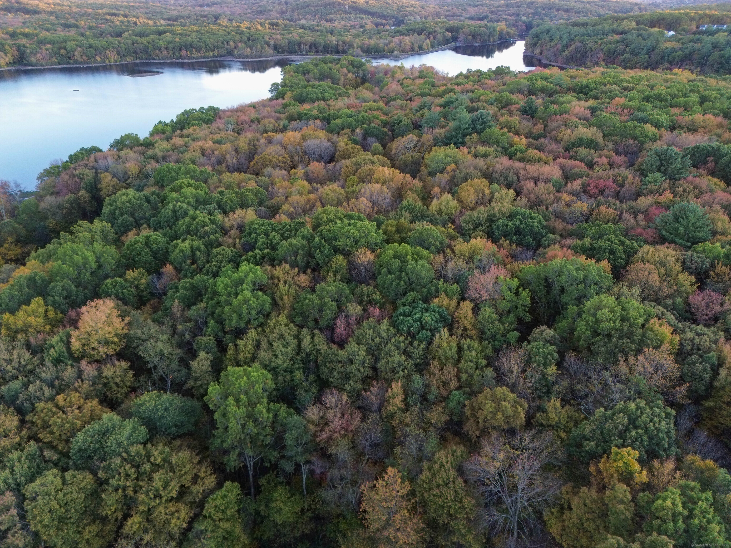 Coe Road Wolcott, CT 06716 - Photo 8 of 24 an aerial view of a residential houses with outdoor space and lake view