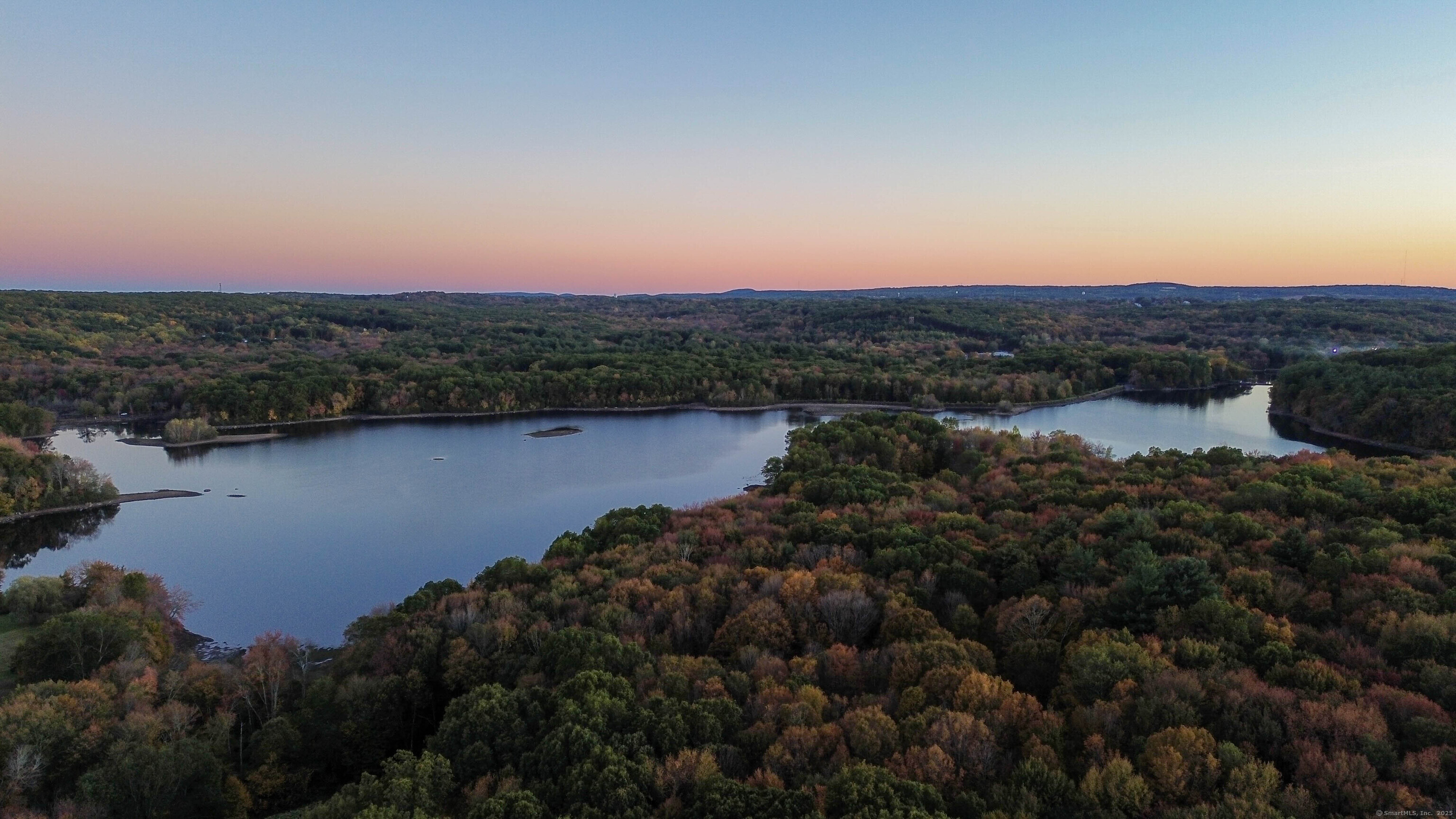 Coe Road Wolcott, CT 06716 - Photo 10 of 24 a view of lake and mountain