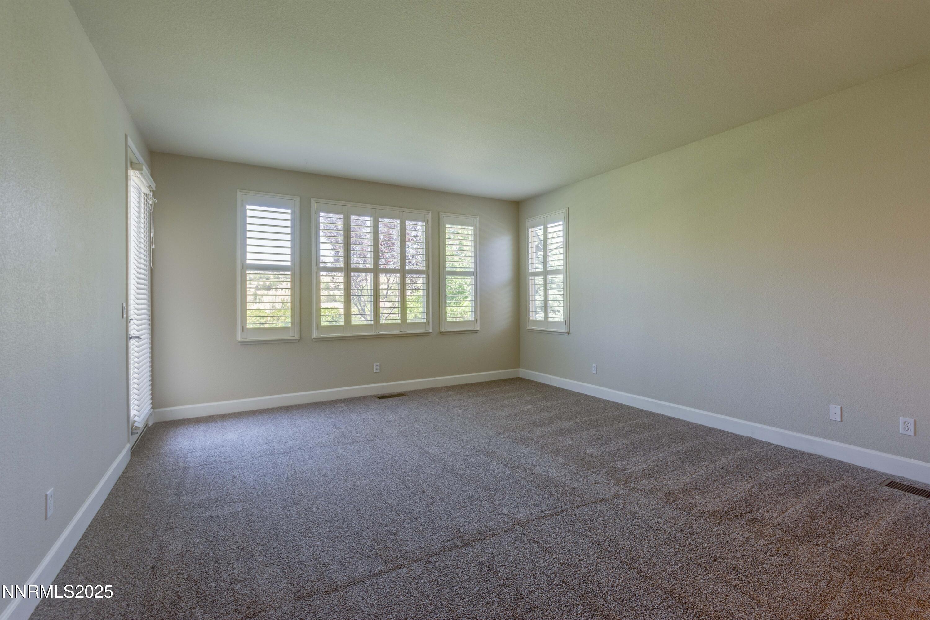 1798 Evening Rock Court Reno, NV 89523 - Photo 14 of 27 an empty room with a window