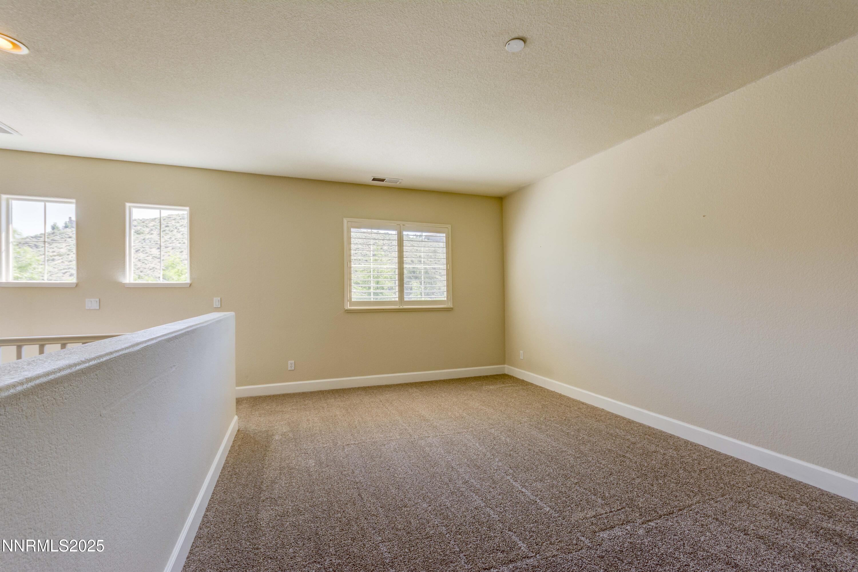 1798 Evening Rock Court Reno, NV 89523 - Photo 19 of 27 a view of an empty room with a window
