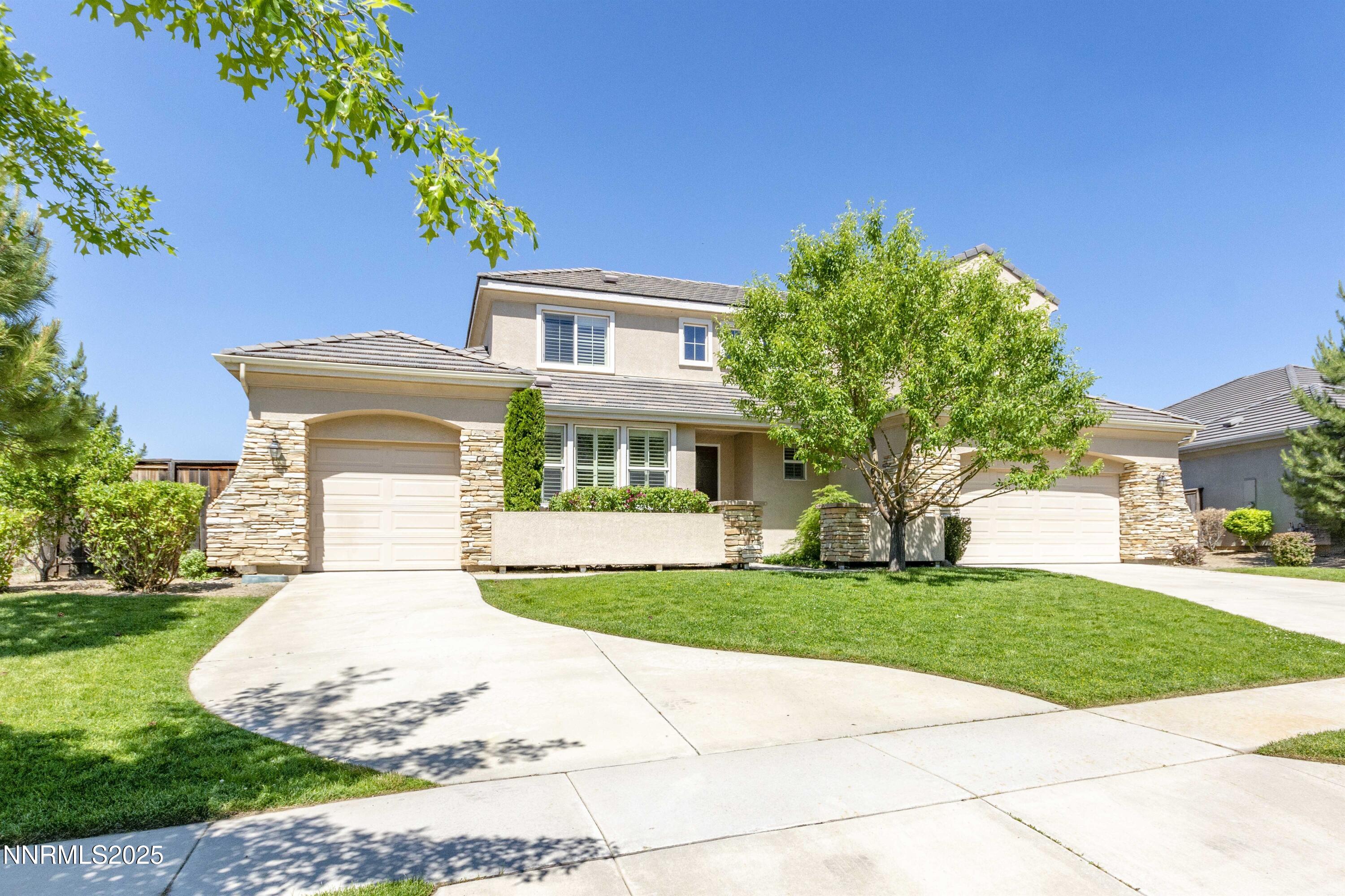 1798 Evening Rock Court Reno, NV 89523 - Photo 2 of 27 a front view of a house with a yard