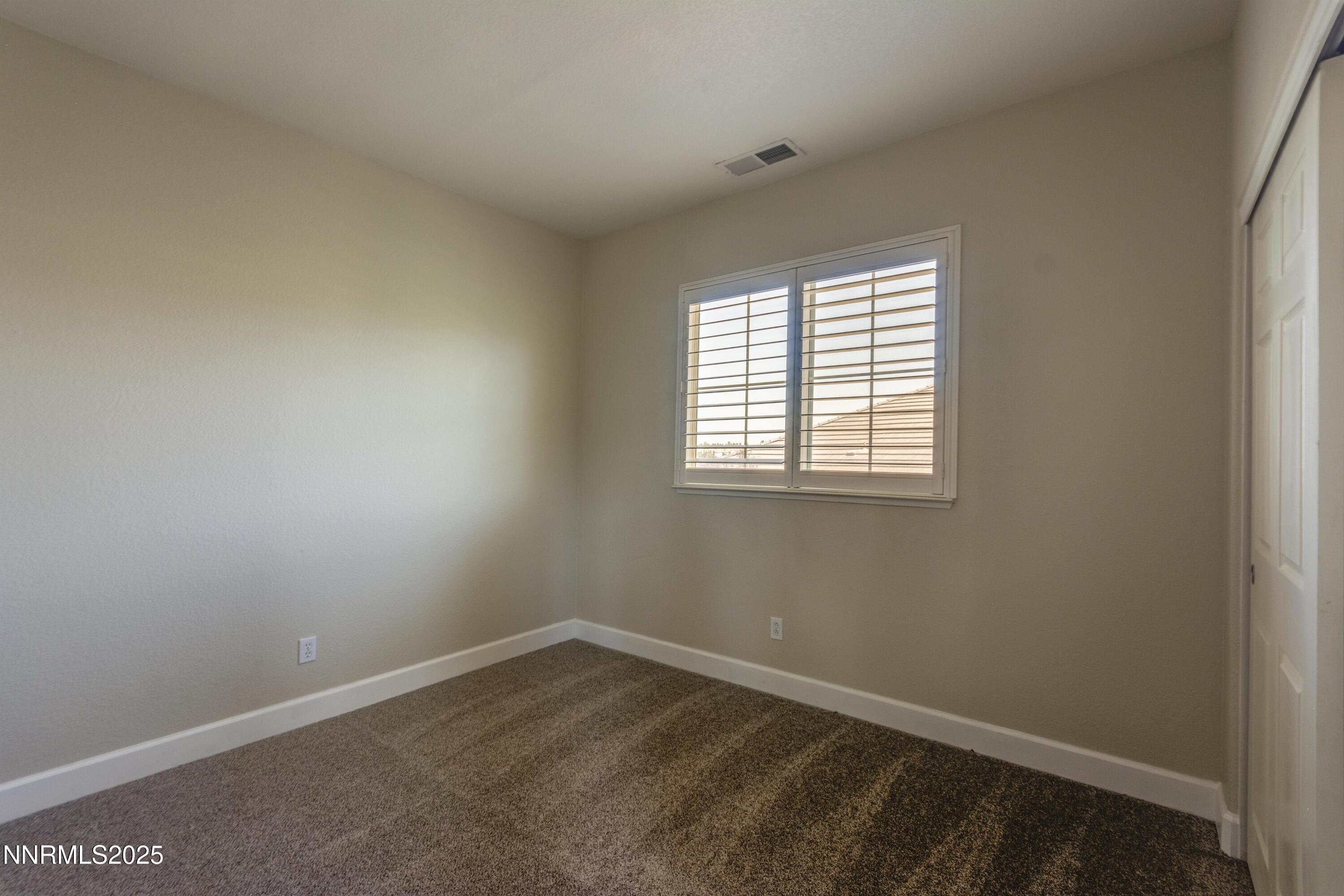1798 Evening Rock Court Reno, NV 89523 - Photo 22 of 27 an empty room with a window