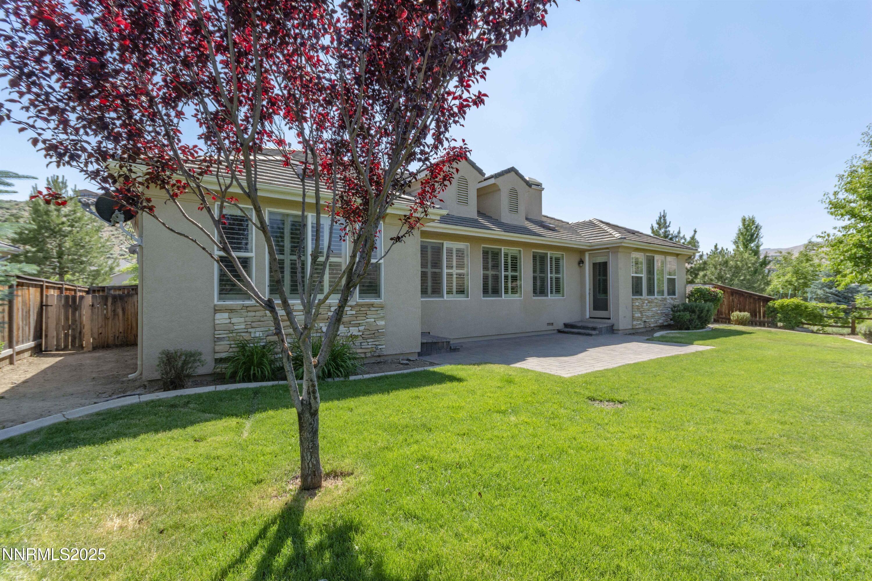 1798 Evening Rock Court Reno, NV 89523 - Photo 26 of 27 a view of a house with a yard