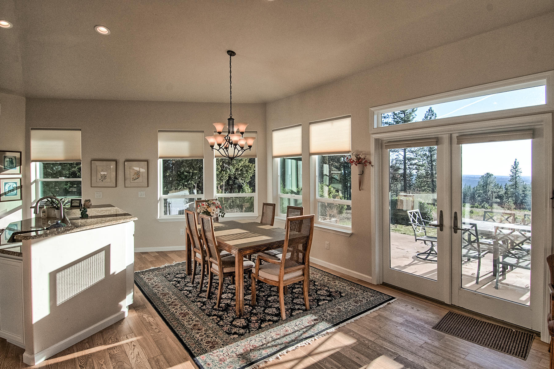 32505 Forwards Ml Road Manton, CA 96059 - Photo 40 of 70 a view of a dining room with furniture wooden floor and a chandelier